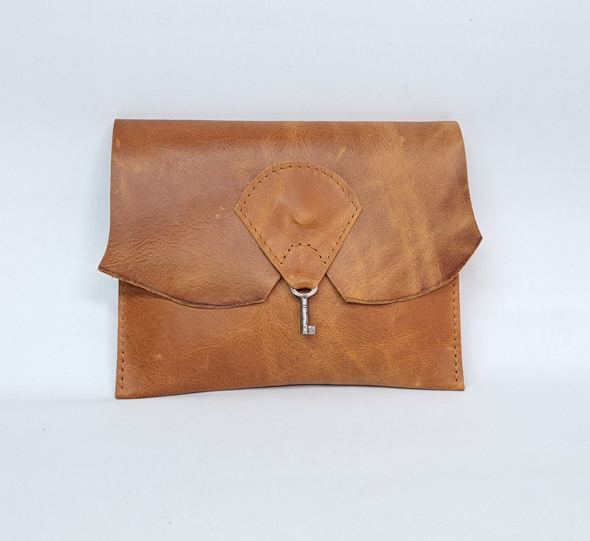 Raw Edge Leather Clutch with Vintage Key Detail - Tan